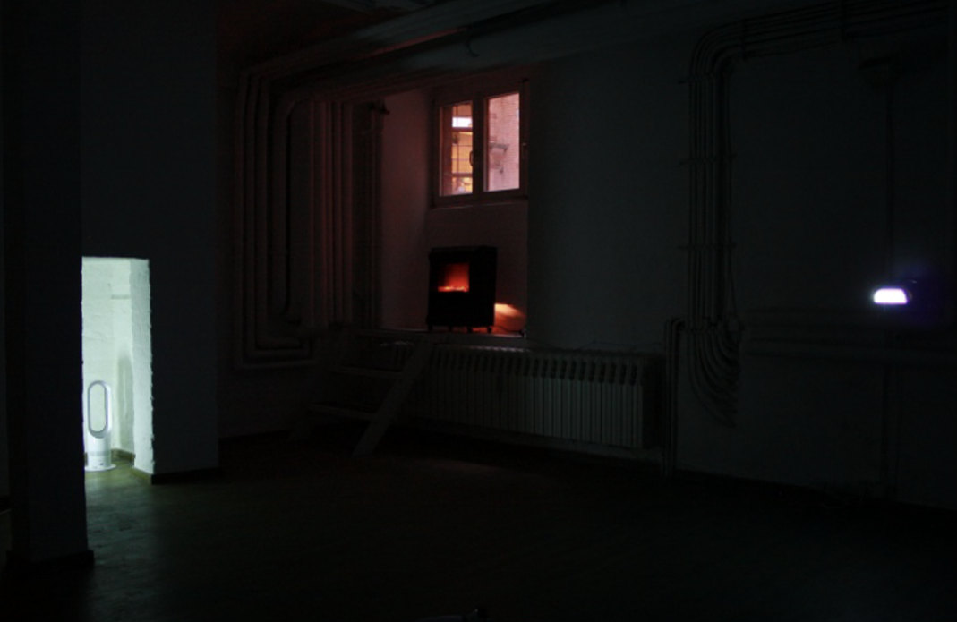 IN & OUT, 2004/2013 — dark cold room with cooling machines, dim glowing appliances, and low light