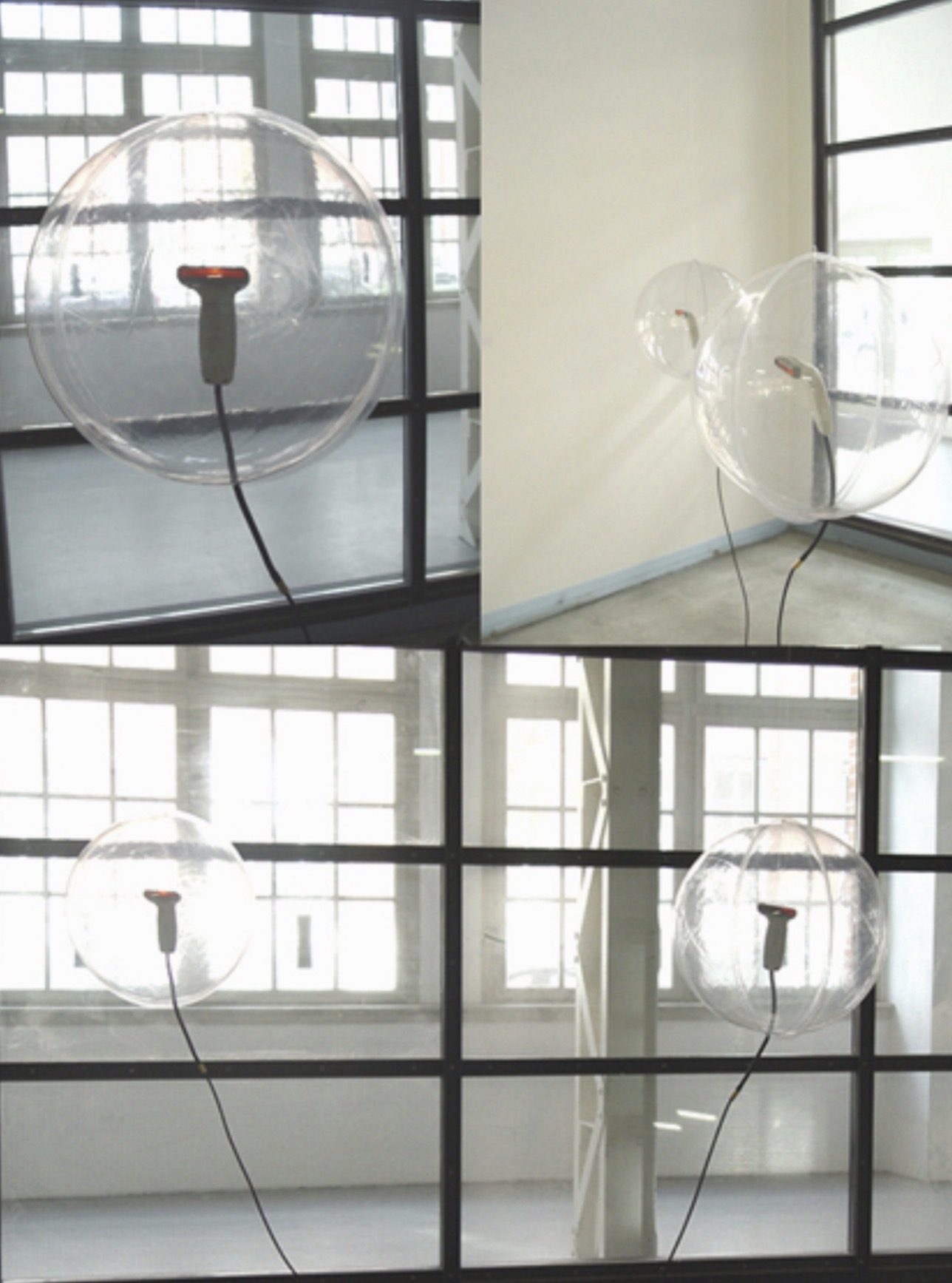EYES — EverybodY is Enlightened Sometimes, 2004 — transparent plastic spheres with barcode scanners installed inside, suspended in front of industrial windows, by Hannes Bend