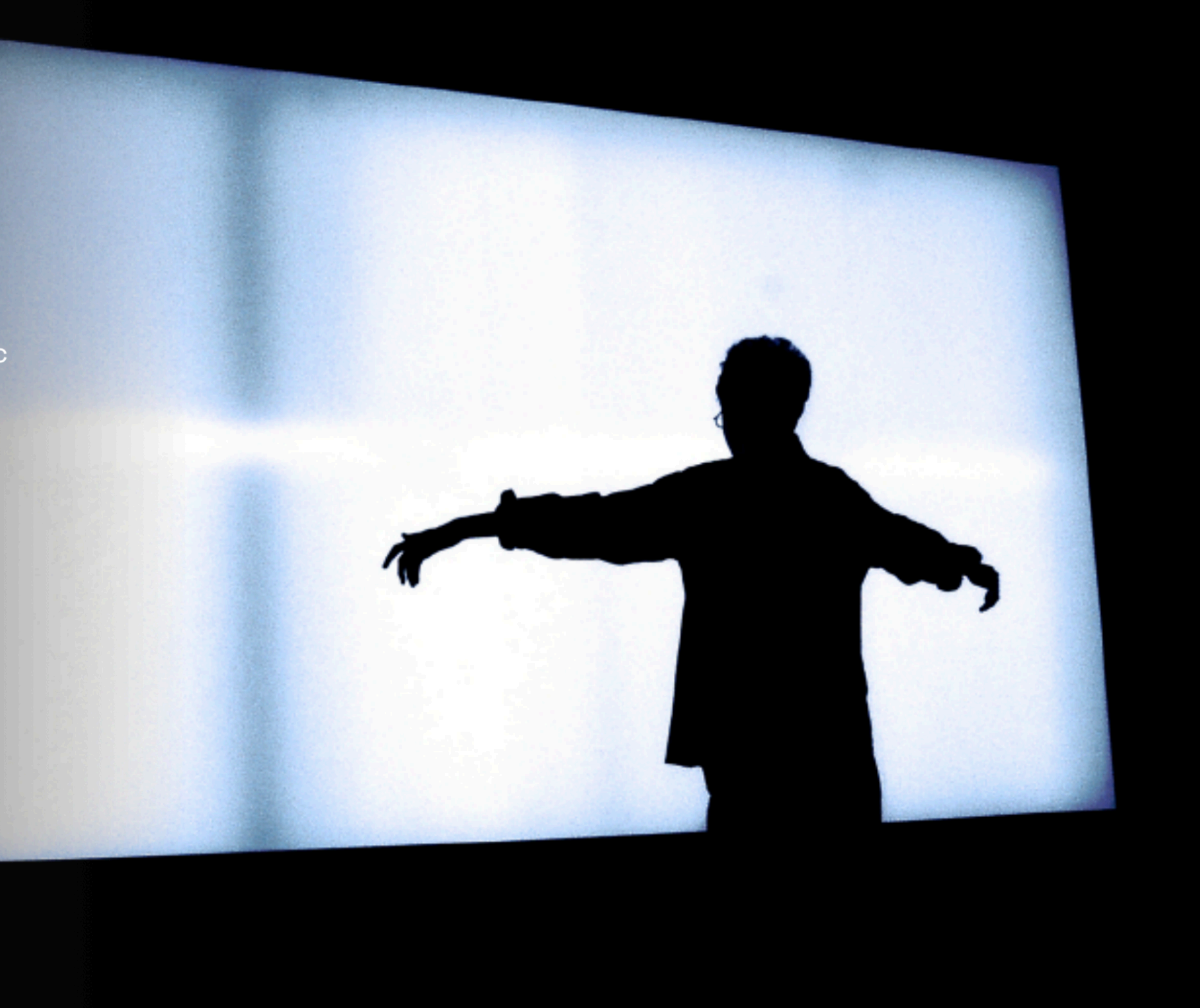 Archival image from the 2020 Heaven or Hell proposal — a silhouetted figure standing before a large bright rectangular light source