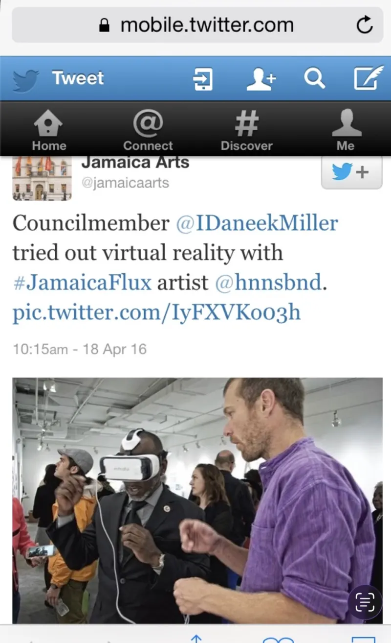 Archived Jamaica Arts tweet, 18 April 2016: "Councilmember @IDaneekMiller tried out virtual reality with #JamaicaFlux artist @hnnsbnd." The photo shows the councilmember wearing the mYndful VR headset.